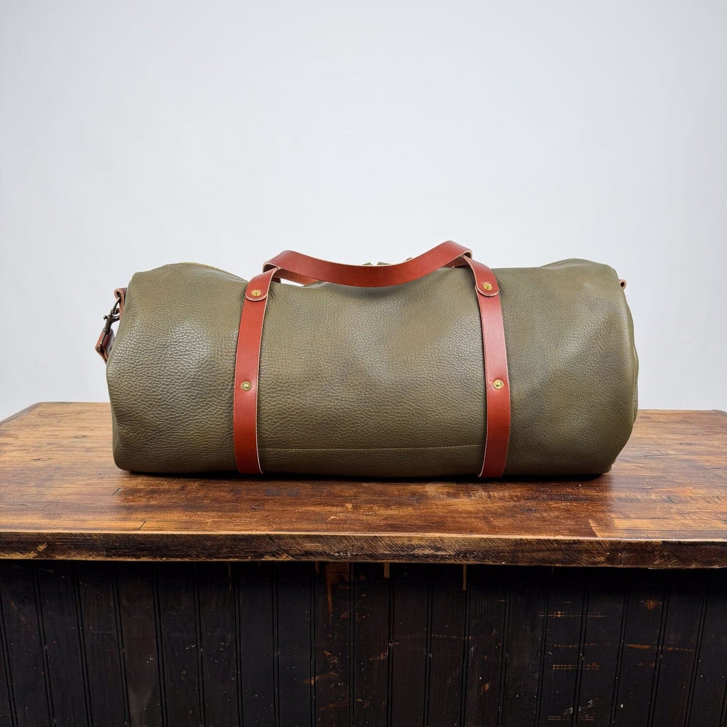 WILLIAM LEATHER DUFFLE BAG - OLIVE - SADDLE STRAPS - IN STOCK